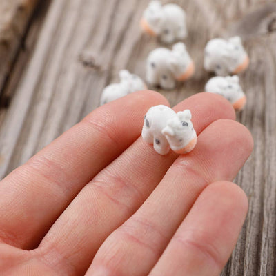 Flocked Tiny Baby Cow - Sold Individually
