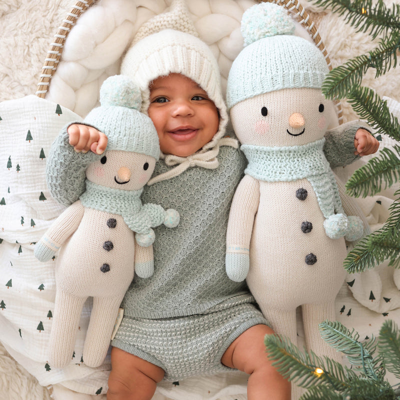 Spruce the snowman , Gives 10 Meals - cuddle+kind
