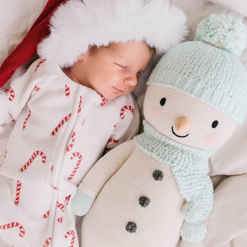Spruce the snowman , Gives 10 Meals - cuddle+kind
