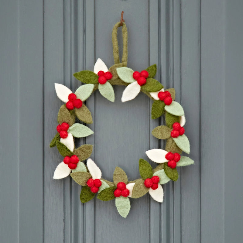 Felt wreath with green and white leaves, and red berries