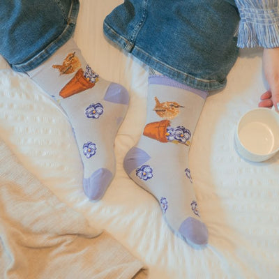 Wren Pottering About Womans Socks